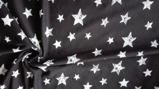 Teplákovina s elastanem hvězdičky na černé